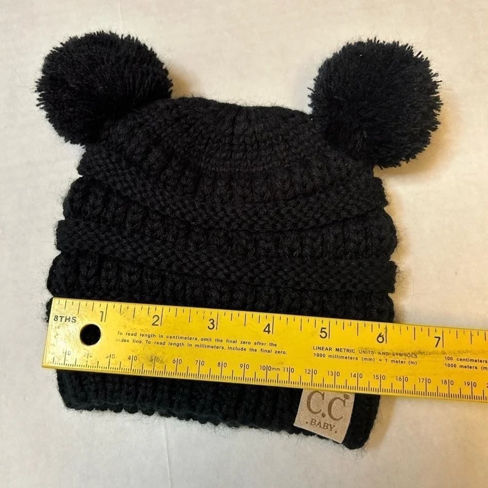 C.C Baby knit design black beanie with a double pom‎ pom! Sz-baby OS. P14